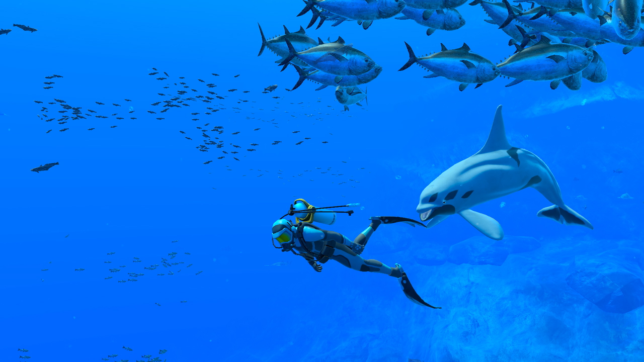 Screen du jeu, un environnement 3D sous l'eau avec une personne en combinaison de plongée entourée de poissons photo-réalistes.
