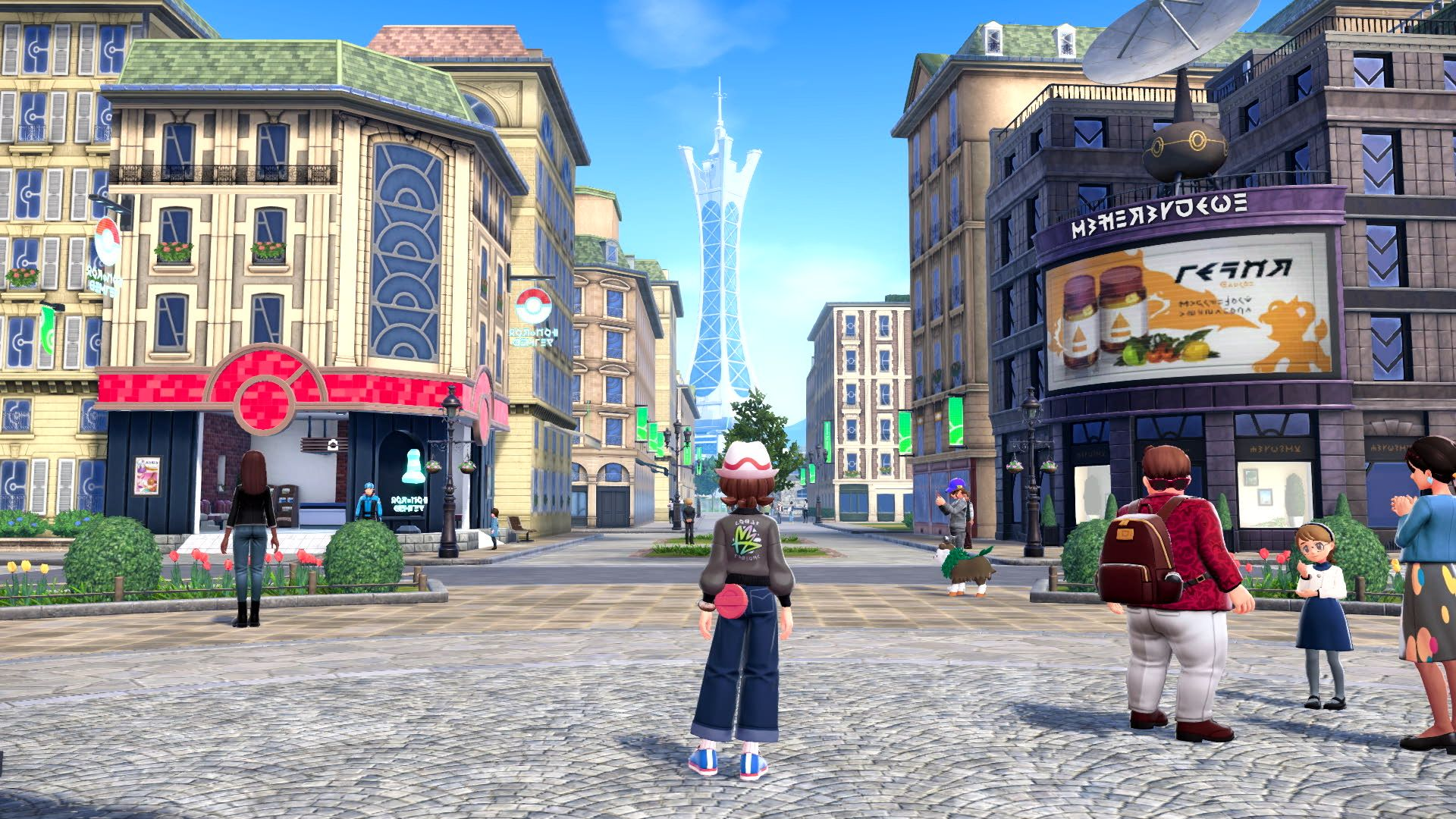 Screenshot du jeu, montrant une vue d'avenue. On voit l'équivalent de la Tour Eiffel au loin, des immeubles de style parisien le long de l'avenue, notre perso au premier plan avec d'autres personnages.