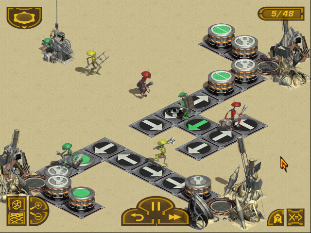 Screenshot de Pit Droids, un jeu où il faut poser des flèches au sol pour guider la marche de droïdes mécano.